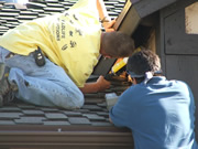 Allstate Animal Control techs sealing roof gaps