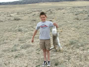 Allstate Animal Control photo kid holding rabbit